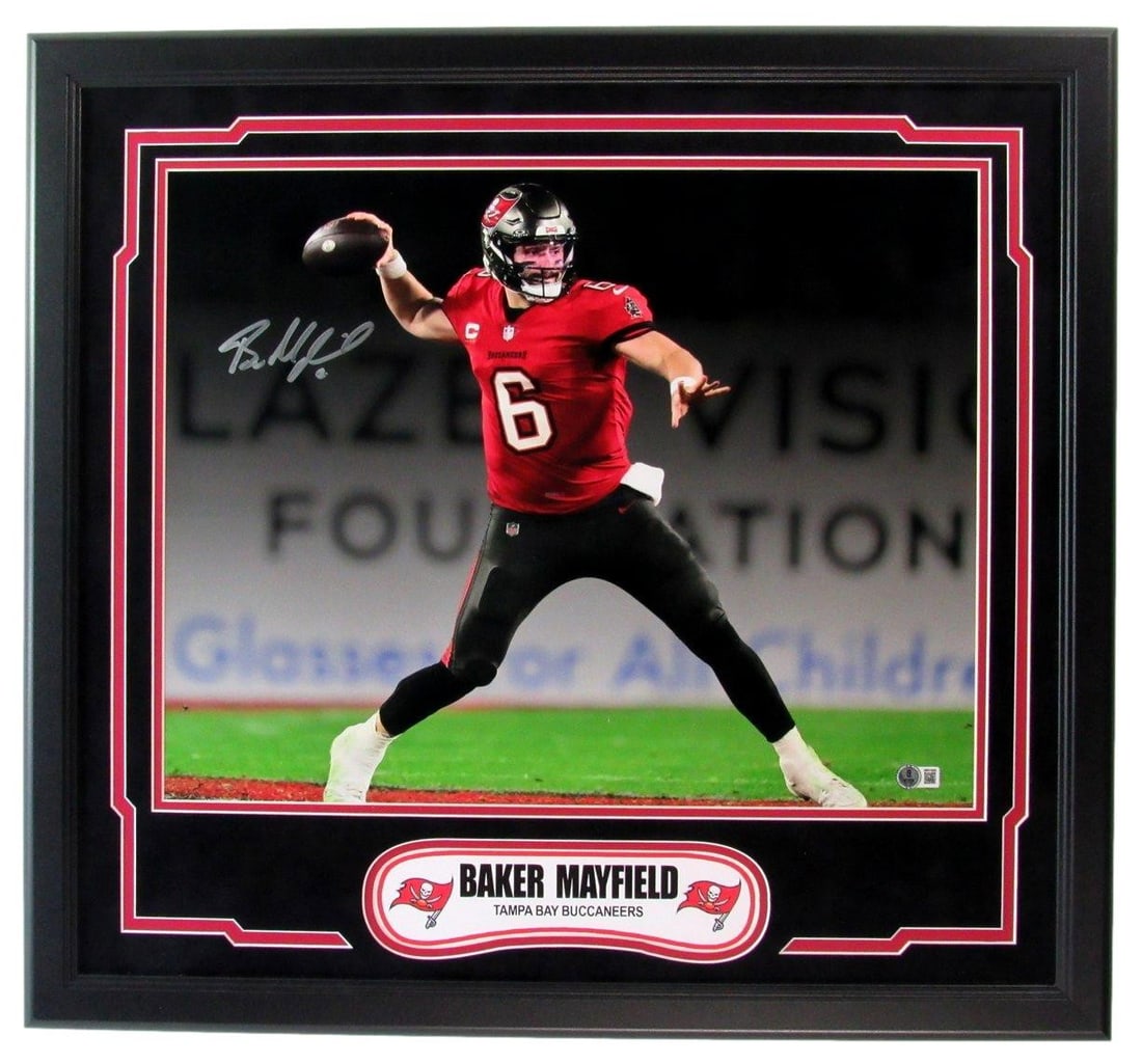 Framed 16x20 Baker Mayfield Autographed Buccaneers Photo Beckett Authenticated: Framed 16x20 Baker Mayfield Autographed Buccaneers Photo Beckett Authenticated This framed 16x20 photo features Baker Mayfield in Tampa Bay Buccaneers attire and includes his authenticated signature. 