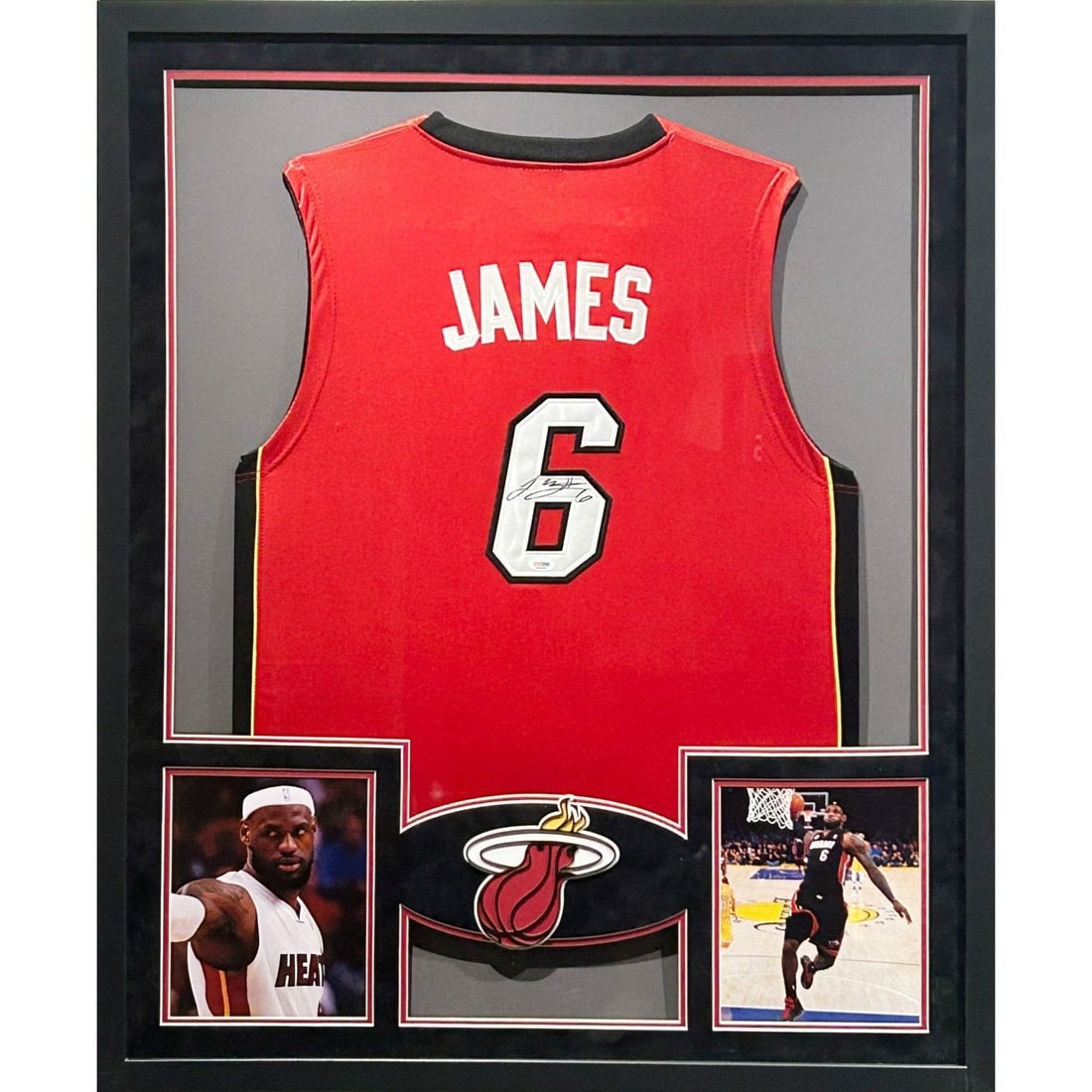 LeBron James Signed Jersey Framed PSA/DNA Authenticated Miami Heat: LeBron James Signed Jersey Framed PSA/DNA Authenticated Miami Heat This autographed LeBron James jersey is beautifully framed and authenticated by PSA/DNA, a leading name in sports memorabilia authent