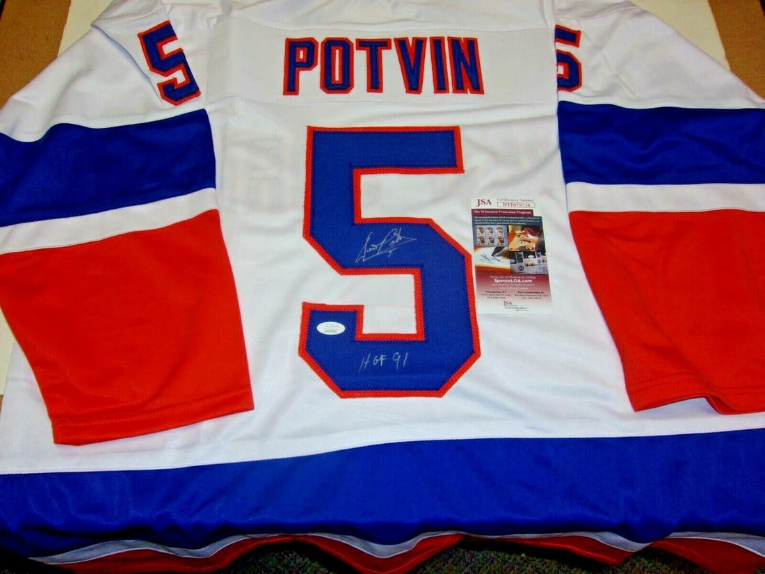Dennis Potvin Autographed White New York Islanders Jersey With JSA COA: Dennis Potvin Autographed White New York Islanders Jersey With JSA COA This is a pre-owned white hockey jersey signed by Dennis Potvin of the New York Islanders. The jersey commemorates his 1991 Hall 