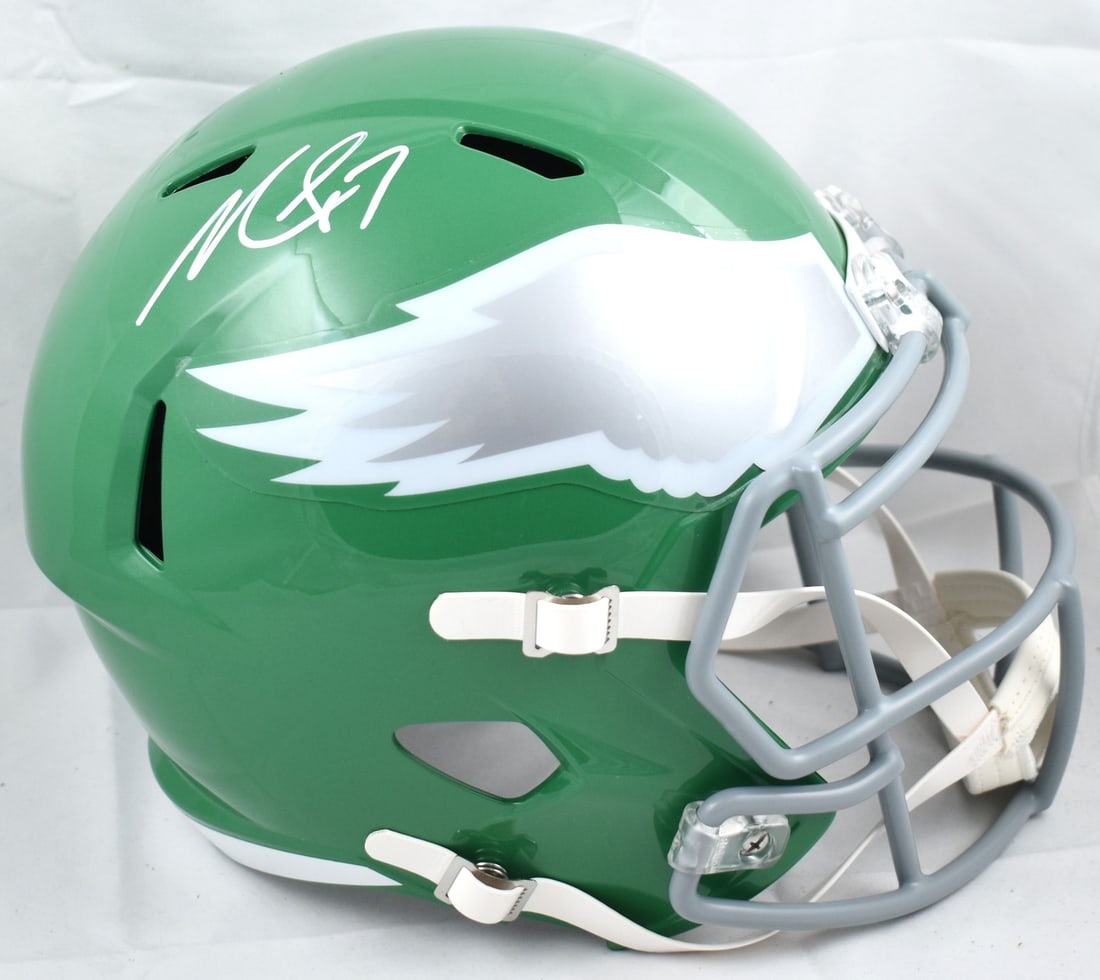Philadelphia Eagles Full Size Speed Helmet Signed by Michael Vick Beckett Authenticated: Philadelphia Eagles Full Size Speed Helmet Signed by Michael Vick Beckett Authenticated This is a pre-owned Philadelphia Eagles full-size alternate Speed helmet autographed by Michael Vick. The helmet