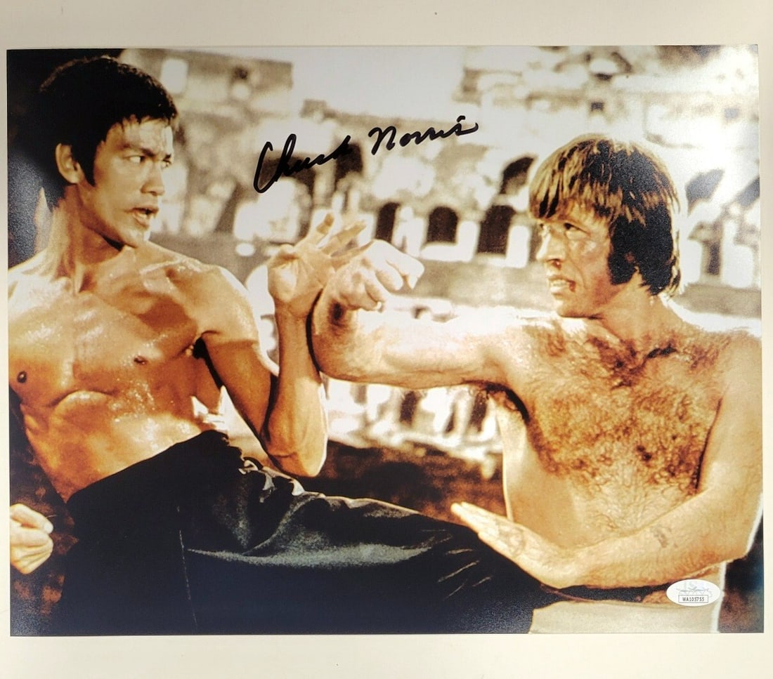 Chuck Norris Signed 11x14 Photograph Return of the Dragon JSA COA: Chuck Norris Signed 11x14 Photograph Return of the Dragon JSA COA This is an original 11x14 photograph featuring Bruce Lee in 'Return of the Dragon', personally signed by the legendary Chuck Norris. T