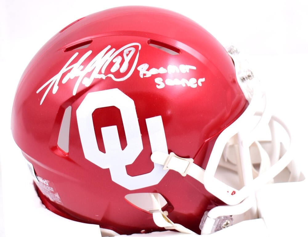 Adrian Peterson Oklahoma Sooners Signed Mini Helmet Beckett Authenticated: Adrian Peterson Oklahoma Sooners Signed Mini Helmet Beckett Authenticated This is a pre-owned Oklahoma Sooners mini helmet, signed by football star Adrian Peterson. The item features Beckett Authentic