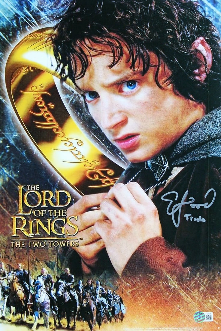 Elijah Wood Frodo Signed 12x18 Photo BAS Authenticated LOTR: Elijah Wood Frodo Signed 12x18 Photo BAS Authenticated LOTR This remarkable 12x18 photograph features Elijah Wood's autograph, personally signed as 'Frodo' from the iconic film, The Lord of the Rings:
