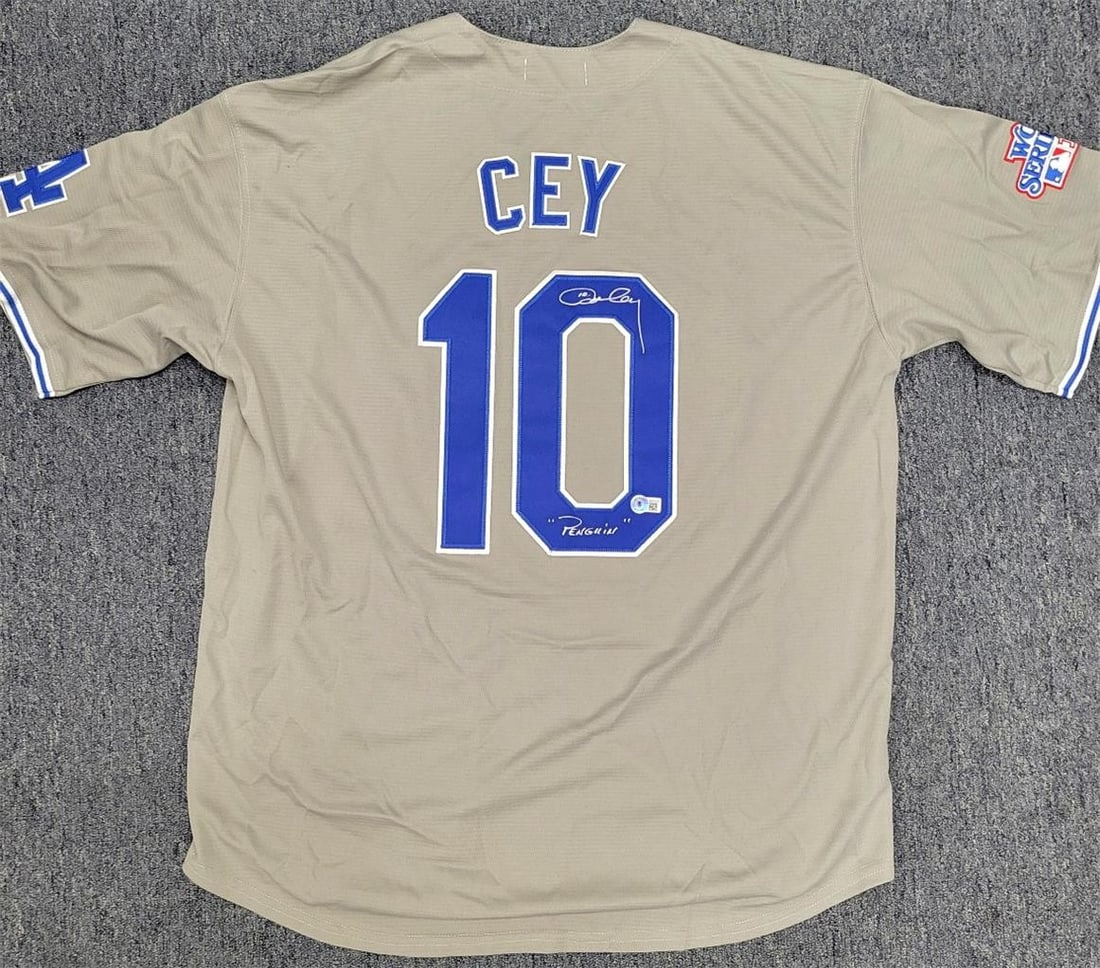 Ron Cey Autographed Los Angeles Dodgers Jersey Beckett Authenticated: Ron Cey Autographed Los Angeles Dodgers Jersey Beckett Authenticated This original Los Angeles Dodgers jersey features the signature of legendary player Ron Cey, known as "The Penguin." Authenticated 