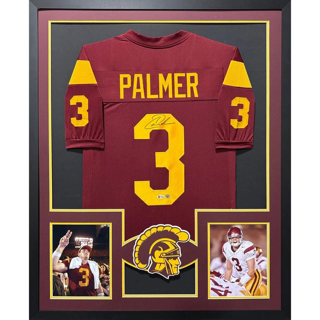 Carson Palmer Signed USC Framed Jersey Beckett Authenticated 42x34: Carson Palmer Signed USC Framed Jersey Beckett Authenticated 42x34 This is a beautifully framed maroon jersey signed by Carson Palmer, a celebrated former USC quarterback. The jersey comes with authen
