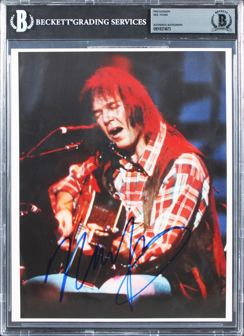 Neil Young Signed 8x10 Photo Crosby Stills Nash & Young Beckett Authenticated: Neil Young Signed 8x10 Photo Crosby Stills Nash & Young Beckett Authenticated This authentic 8x10 photo features the signature of Neil Young, a prominent member of the iconic group Crosby, Stills, Nas