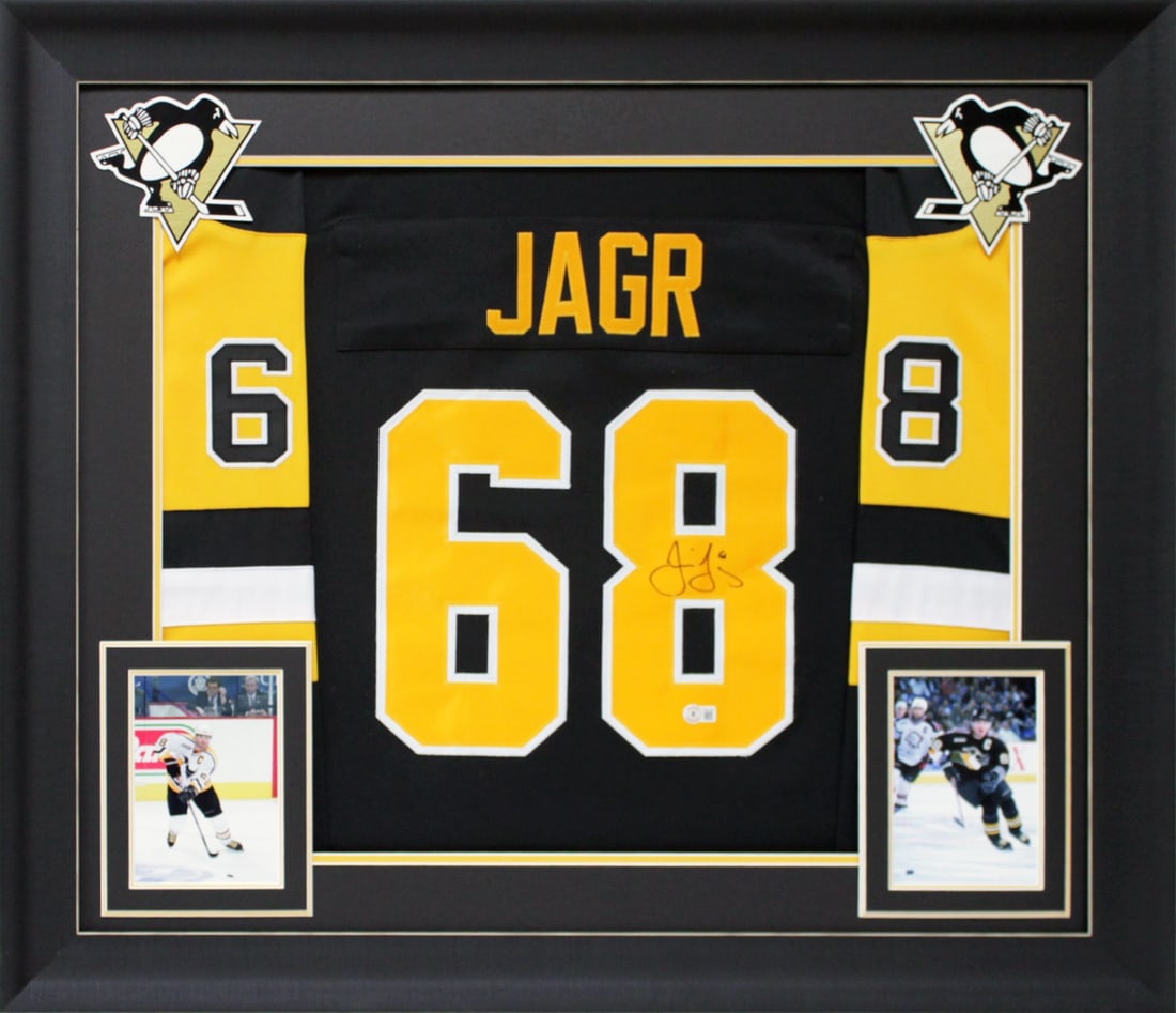 Jaromir Jagr Signed Black Framed Jersey Pittsburgh Penguins Beckett Authenticated: Jaromir Jagr Signed Black Framed Jersey Pittsburgh Penguins Beckett Authenticated This authentic black pro style framed jersey is a remarkable collectible featuring the iconic Jaromir Jagr, who has pe