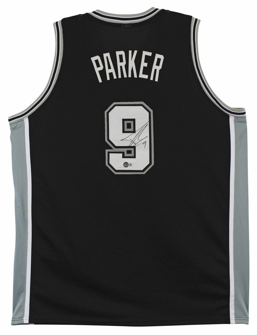 San Antonio Spurs Black Jersey Signed by Tony Parker Beckett Witnessed: San Antonio Spurs Black Jersey Signed by Tony Parker Beckett Witnessed This black pro style jersey has been personally signed by Tony Parker of the San Antonio Spurs. The autograph is witnessed and au