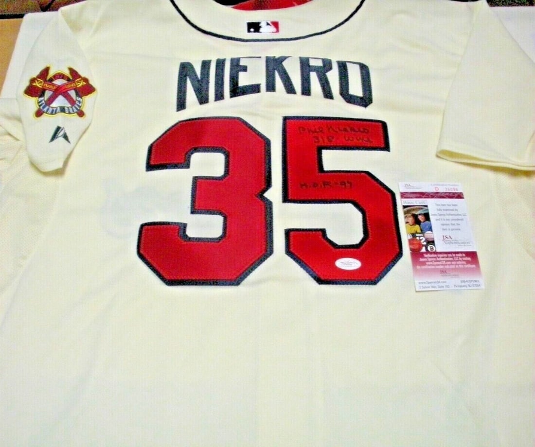 Majestic Atlanta Braves Jersey Signed by Phil Niekro with JSA Authentication: Majestic Atlanta Braves Jersey Signed by Phil Niekro with JSA Authentication This is a pre-owned, officially licensed Majestic jersey signed by Phil Niekro of the Atlanta Braves. The jersey is authent