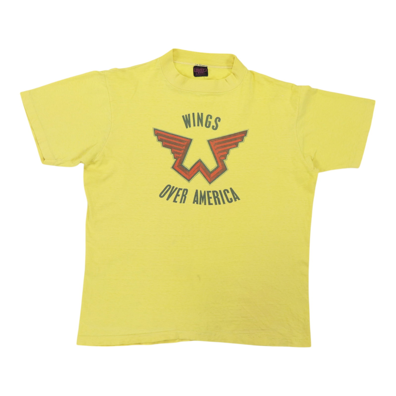 Vintage 1976 Wings Over America Yellow Cotton Concert Shirt: Vintage 1976 Wings Over America Yellow Cotton Concert Shirt This is an original vintage 1976 Wings Over America shirt featuring graphics on both the front and back. Made from 100% cotton in yellow,
