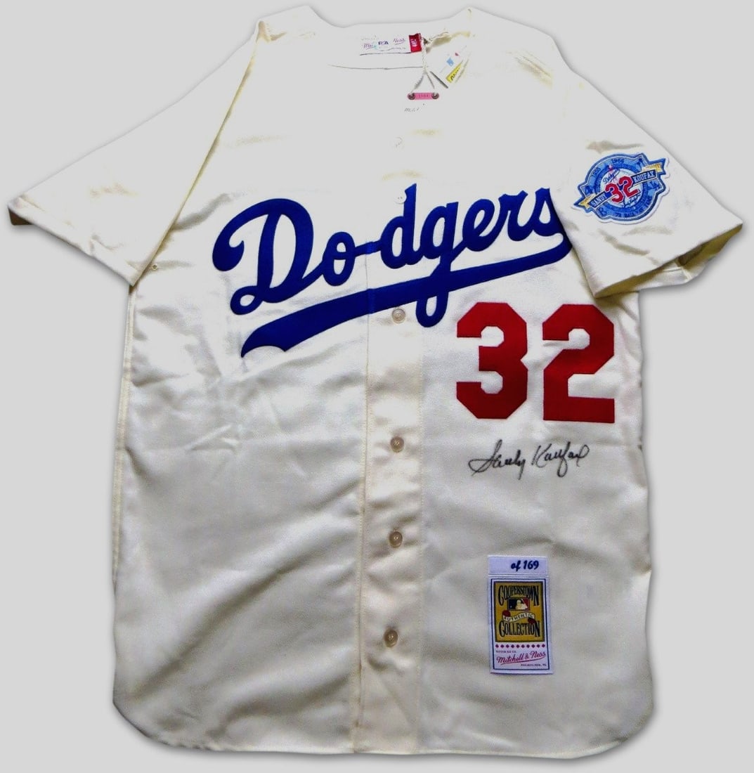 Sandy Koufax Signed Mitchell & Ness Jersey Dodgers Limited Edition 45/169 MLB Authenticated: Sandy Koufax Signed Mitchell & Ness Jersey Dodgers Limited Edition 45/169 MLB Authenticated Celebrate the legacy of baseball legend Sandy Koufax with this autographed Mitchell & Ness jersey from the