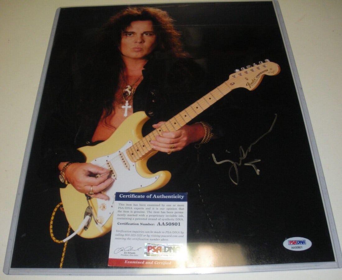 Yngwie Malmsteen Autographed 11x14 Stratocaster Photo PSA DNA Certified: Yngwie Malmsteen Autographed 11x14 Stratocaster Photo PSA DNA Certified This is an original 11x14 photograph featuring the famous guitarist Yngwie Malmsteen, signed and accompanied by a PSA/DNA Certif