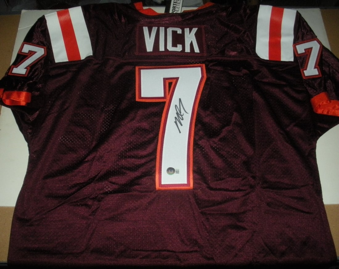 Michael Vick Virginia Tech Signed Sportex Jersey with COA: Michael Vick Virginia Tech Signed Sportex Jersey with COA Celebrate the legacy of Michael Vick with this officially licensed Sportex jersey. This pre-owned jersey is a must-have for any football fan, 