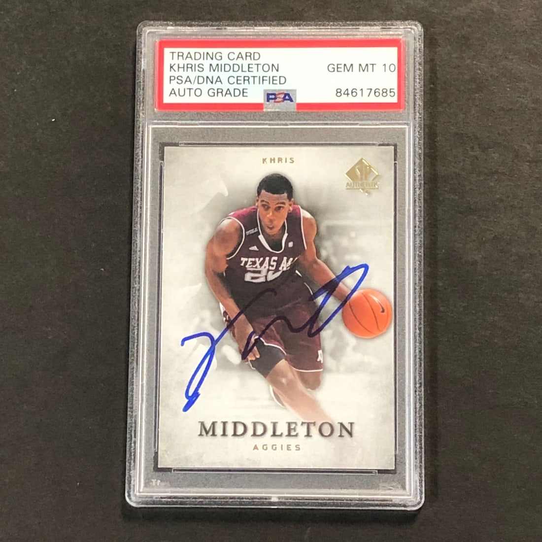 Khris Middleton Signed 2012-13 Upper Deck SP Authentic #35 Card PSA/DNA: Khris Middleton Signed 2012-13 Upper Deck SP Authentic #35 Card PSA/DNA This is a 2012-13 Upper Deck SP Authentic #35 basketball card, personally signed by Khris Middleton of the Milwaukee Bucks. The 