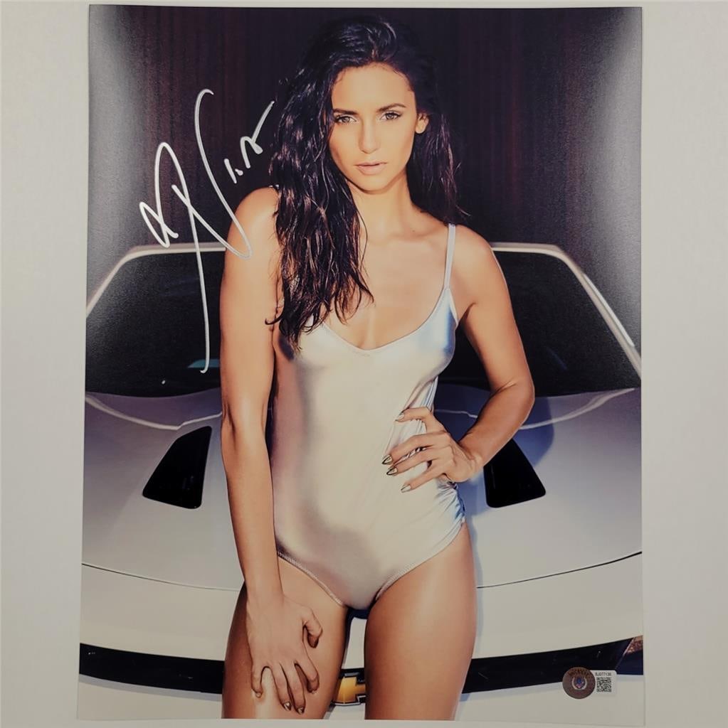 The Vampire Diaries 11x14 Photo Signed by Nina Dobrev Beckett Authenticated: The Vampire Diaries 11x14 Photo Signed by Nina Dobrev Beckett Authenticated This is an original 11x14 photograph from The Vampire Diaries, personally signed by Nina Dobrev. The autograph is authentica