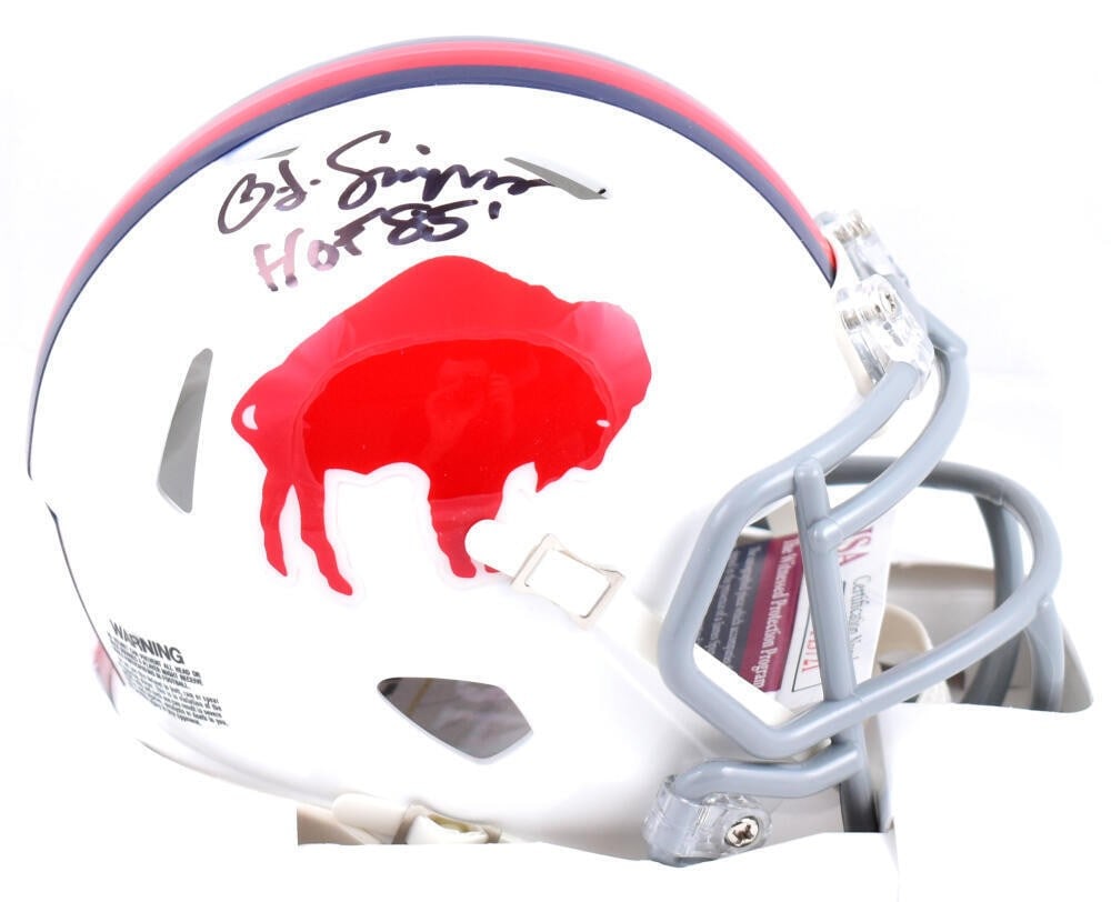 O.J. Simpson Signed Buffalo Bills Mini Helmet JSA Authenticated: O.J. Simpson Signed Buffalo Bills Mini Helmet JSA Authenticated This O.J. Simpson autographed mini helmet is a must-have for any Buffalo Bills fan. The helmet features a sleek design representing the 