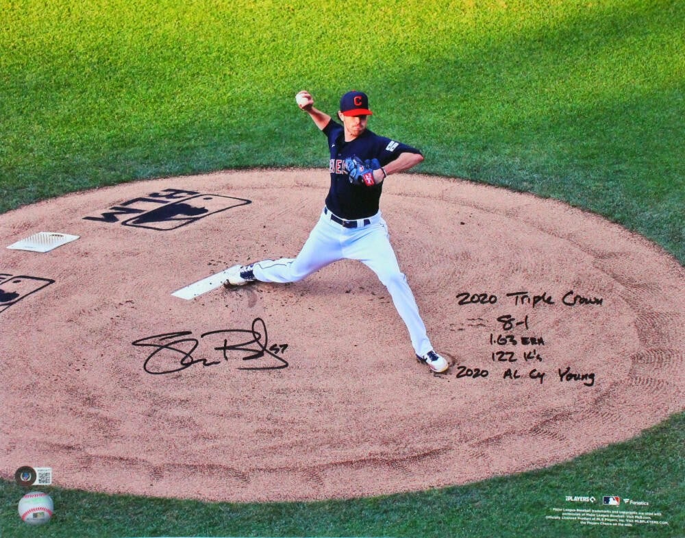 Shane Bieber Autographed Cleveland Indians 16X20 Photo with Inscriptions Beckett Authenticated: Shane Bieber Autographed Cleveland Indians 16X20 Photo with Inscriptions Beckett Authenticated This is an original 16" x 20" photo featuring Shane Bieber, a standout player for the Cleveland Indians, 