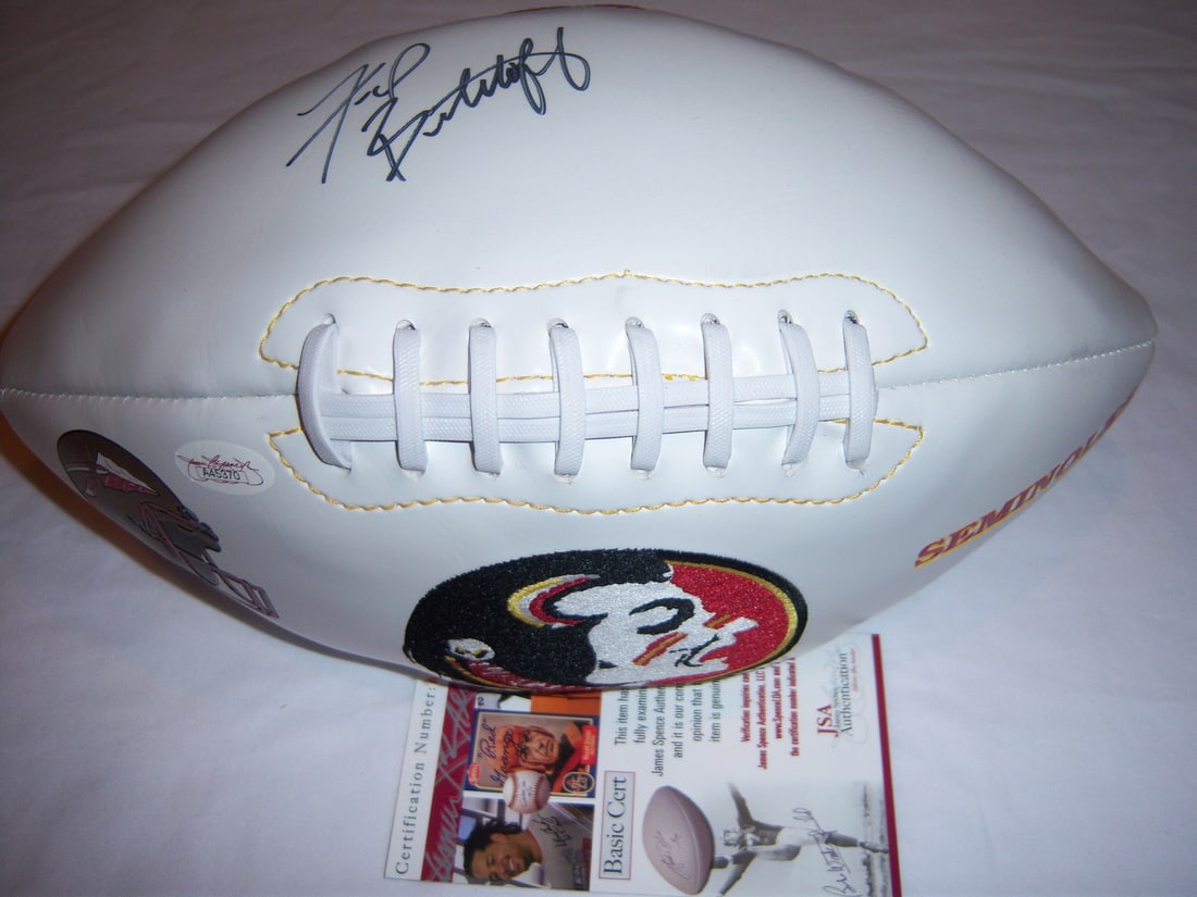 JSA Certified Fred Biletnikoff Autographed Football with Florida State Inscription: JSA Certified Fred Biletnikoff Autographed Football with Florida State Inscription This football is signed by Fred Biletnikoff, known for his time with the Florida State Seminoles and the Raiders. The