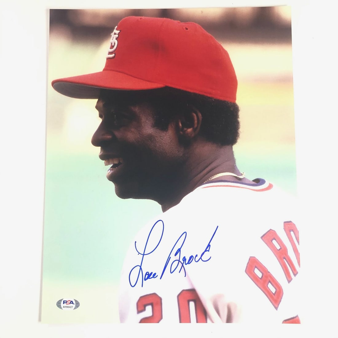 Lou Brock Autographed 11x14 Photo PSA/DNA St. Louis Cardinals: Lou Brock Autographed 11x14 Photo PSA/DNA St. Louis Cardinals This is an original, professionally printed 11x14 photograph of Lou Brock, a legendary player for the St. Louis Cardinals. The photo featu
