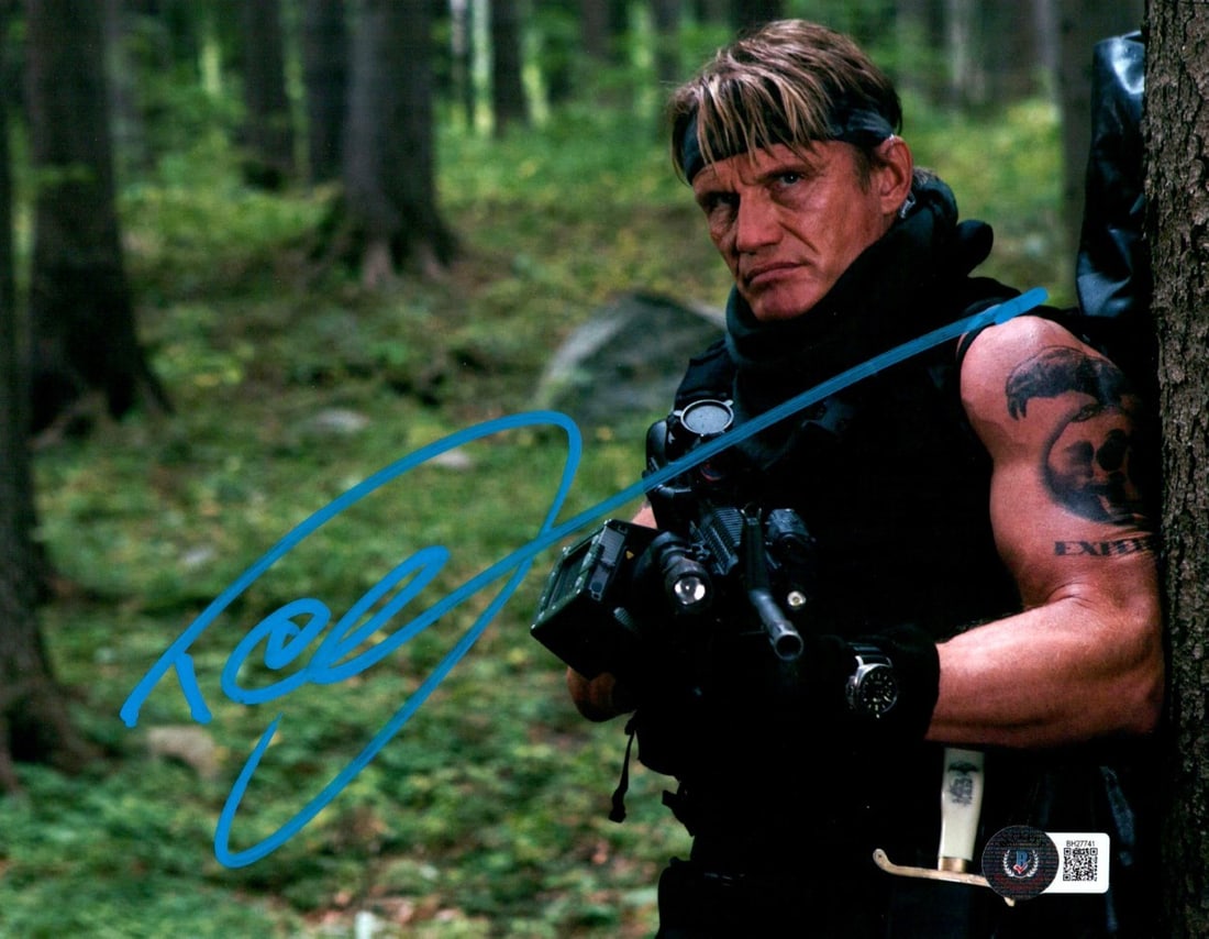 Dolph Lundgren Autographed 8X10 Expendables Photo Beckett Authenticated: Dolph Lundgren Autographed 8X10 Expendables Photo Beckett Authenticated This 8x10 photograph from The Expendables features the authentic signature of Dolph Lundgren. The autograph has been authenticat