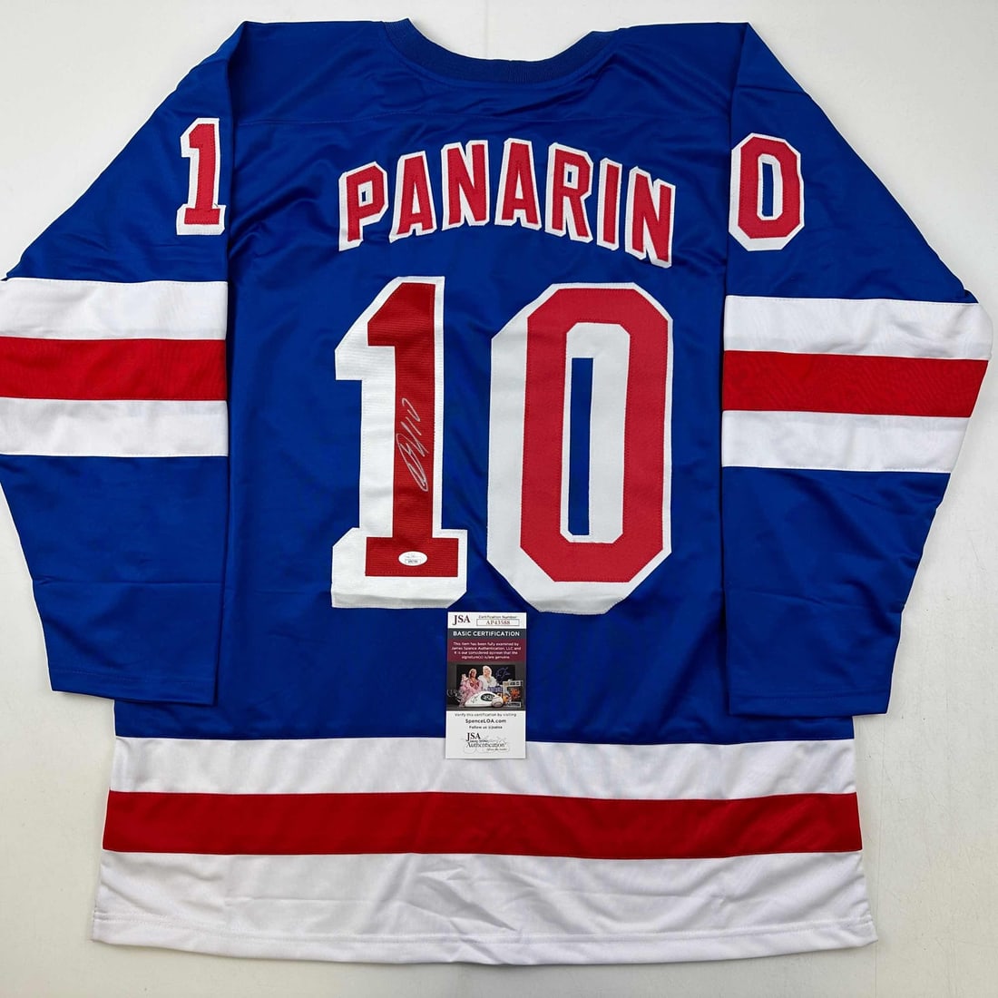 Autographed Artemi Panarin New York Rangers Blue Jersey JSA COA: Autographed Artemi Panarin New York Rangers Blue Jersey JSA COA Celebrate your love for hockey with this autographed Artemi Panarin New York Blue Hockey Jersey, featuring a certificate of authenticity