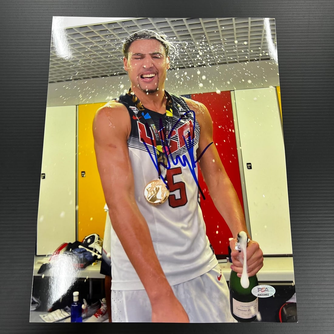 Klay Thompson Autographed 11x14 USA Basketball Photo PSA/DNA Authenticated: Klay Thompson Autographed 11x14 USA Basketball Photo PSA/DNA Authenticated This is a professionally printed 11x14 photograph featuring Klay Thompson of the Golden State Warriors. The photo has been ha