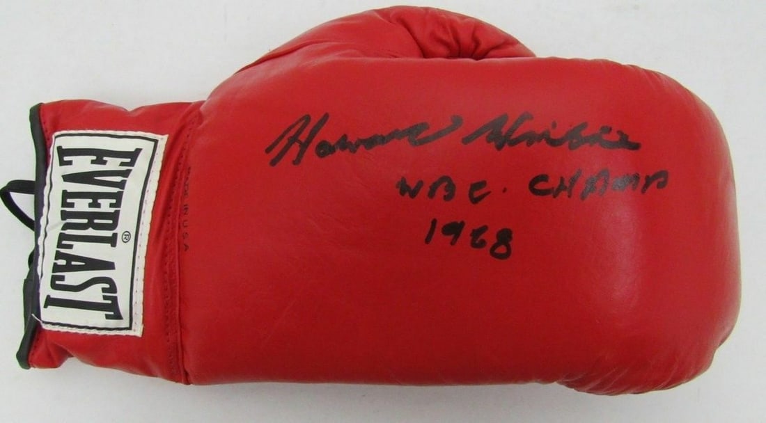 Howard Winstone Signed Risen Everlast Boxing Glove JSA Authenticated: Howard Winstone Signed Risen Everlast Boxing Glove JSA Authenticated Featuring a hand-signed boxing glove from the legendary Howard Winstone, known as "The Welsh Wizard." This original Everlast glove 