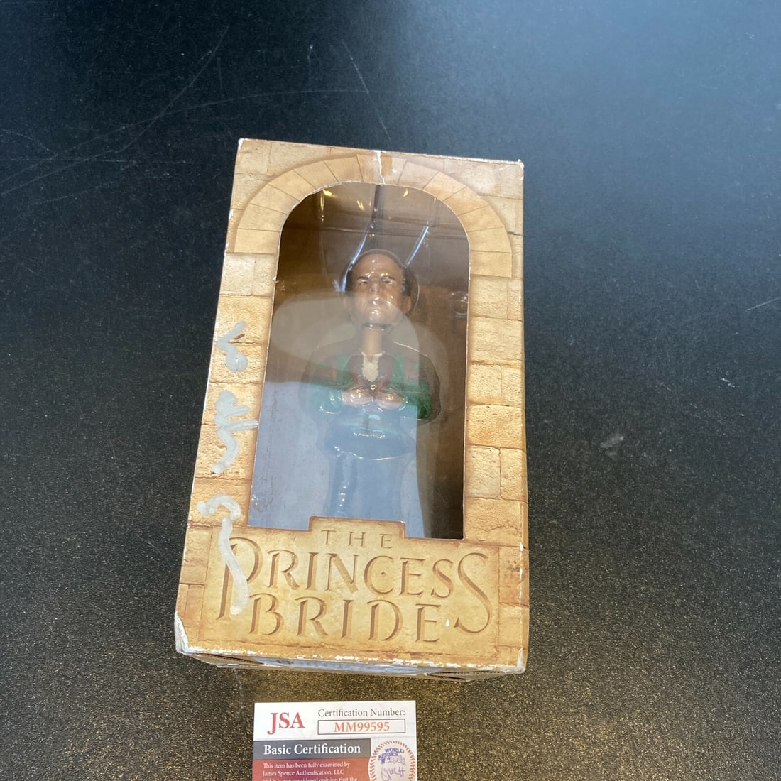Vizzini Bobblehead Autographed by Wallace Shawn with JSA Authentication: Vizzini Bobblehead Autographed by Wallace Shawn with JSA Authentication This Vizzini bobblehead from The Princess Bride is signed by Wallace Shawn and comes with a certificate of authenticity from Jam