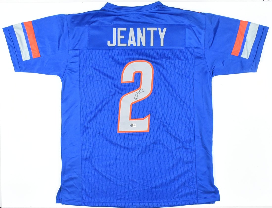 Ashton Jeanty Signed Blue Boise State University Jersey Beckett Hologram: Ashton Jeanty Signed Blue Boise State University Jersey Beckett Hologram This is a blue college style jersey autographed by Ashton Jeanty. The jersey represents Boise State University and is authentic