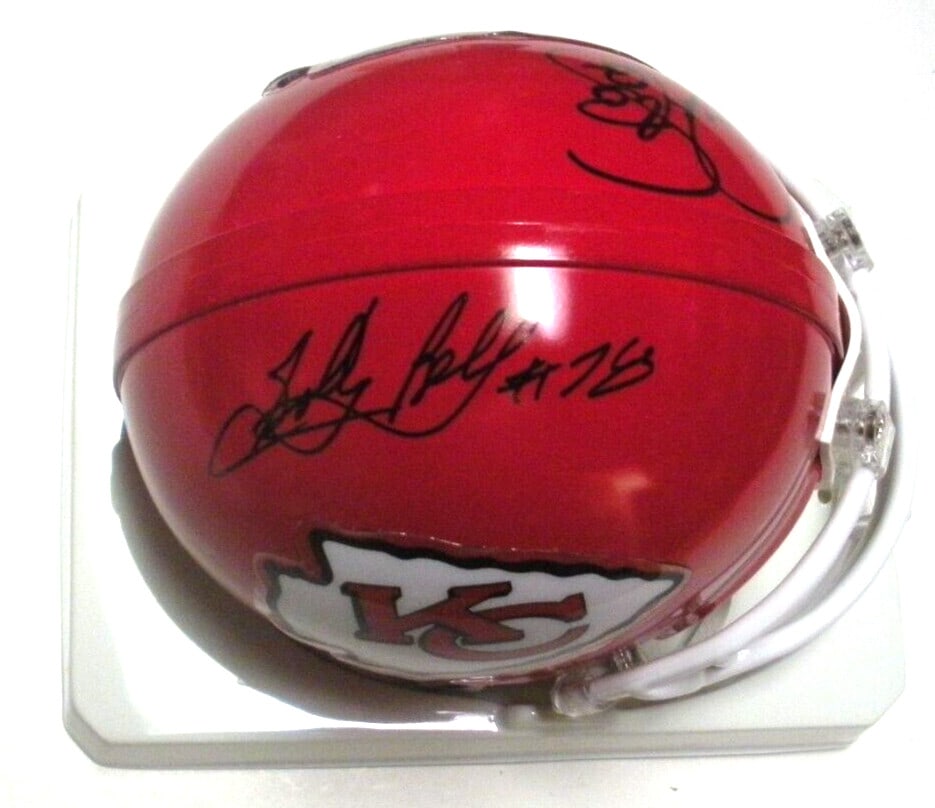Kansas City Chiefs Mini Helmet Signed by Bell Still Podolak with COA: Kansas City Chiefs Mini Helmet Signed by Bell Still Podolak with COA This Kansas City Chiefs mini helmet is signed by Bobby Bell, Art Still, and Ed Podolak. The item includes a Certificate of Authenti