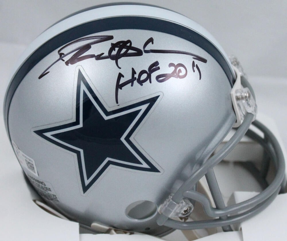 Dallas Cowboys Mini Helmet Signed by Deion Sanders Beckett Authenticated: Dallas Cowboys Mini Helmet Signed by Deion Sanders Beckett Authenticated This Dallas Cowboys mini helmet features an authentic signature from Deion Sanders, complete with a Hall of Fame inscription. T