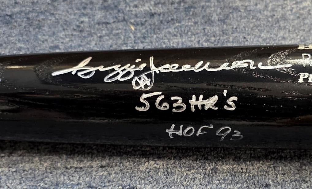 Reggie Jackson autographed Rawlings black baseball bat PSA: Reggie Jackson autographed Rawlings black baseball bat PSA This Rawlings black bat features the authentic signature of Reggie Jackson, inscribed with "563 HR, HOF 93." The autograph has been authentic