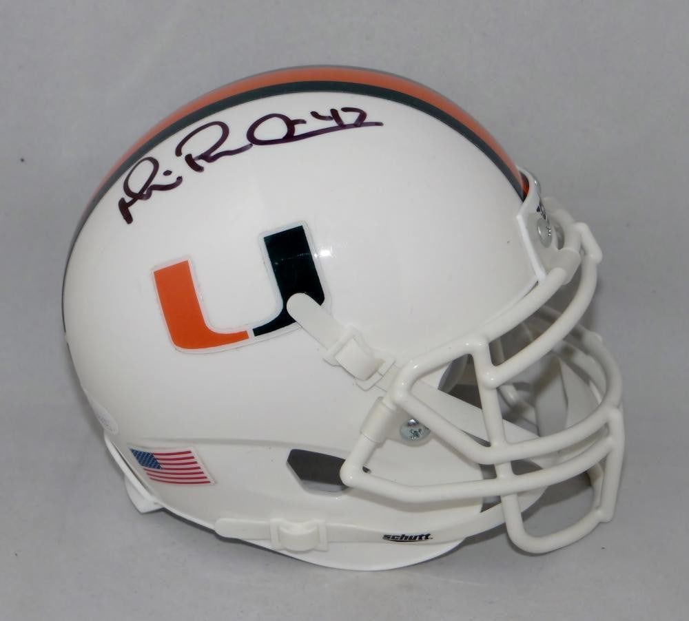 Miami Hurricanes Schutt Mini Helmet Signed by Michael Irvin JSA Authenticated: Miami Hurricanes Schutt Mini Helmet Signed by Michael Irvin JSA Authenticated This is a pre-owned Miami Hurricanes Schutt mini helmet autographed by Michael Irvin. The autograph is authenticated by Ja