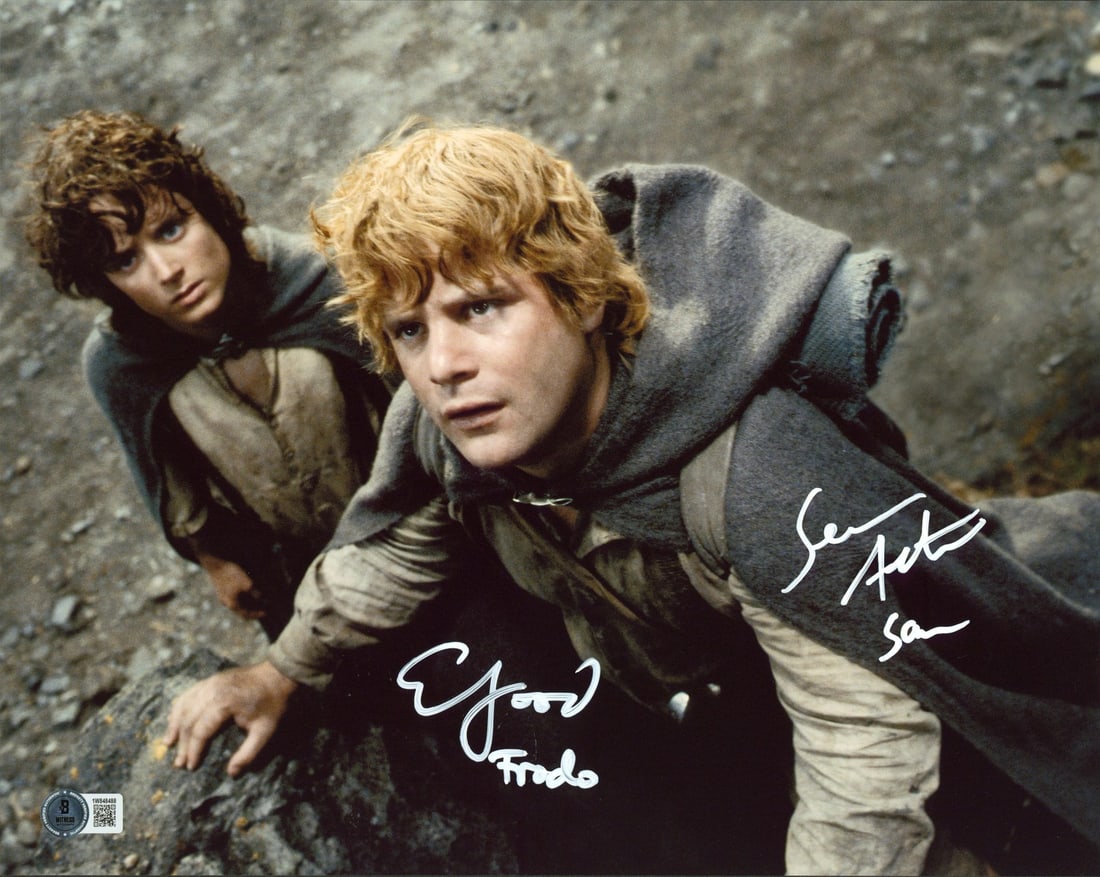 Elijah Wood Sean Astin Signed 11x14 Lord of the Rings Photo BAS Authenticated: Elijah Wood Sean Astin Signed 11x14 Lord of the Rings Photo BAS Authenticated This stunning 11x14 horizontal photograph features the iconic duo Elijah Wood and Sean Astin from the beloved film franchi