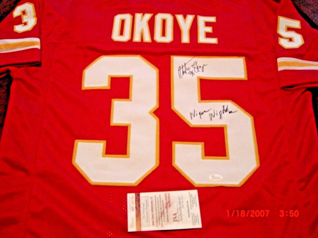 Signed Kansas City Chiefs Jersey Autographed by Christian Okoye with JSA COA: Signed Kansas City Chiefs Jersey Autographed by Christian Okoye with JSA COA This is a pre-owned Kansas City Chiefs jersey signed by Christian Okoye, also known as the "Nigerian Nightmare." The jersey