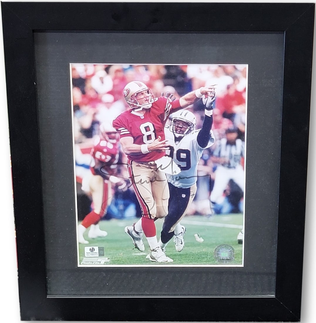Framed Steve Young Photo with Authentic Signature San Francisco 49ers GAI Cert: Framed Steve Young Photo with Authentic Signature San Francisco 49ers GAI Cert This framed photo features an authentic signature from Steve Young of the San Francisco 49ers. The autograph has been aut