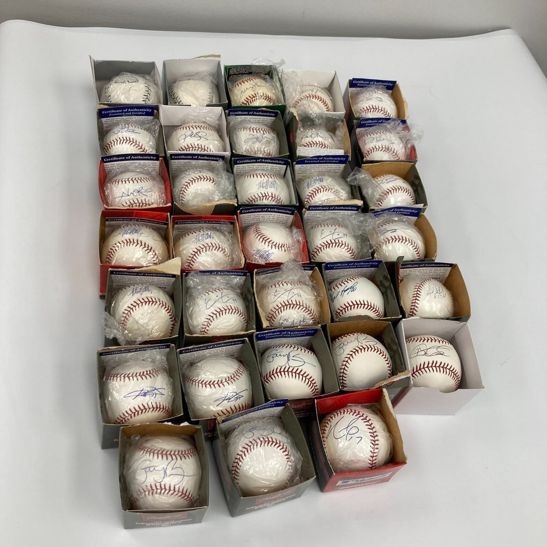 Collection of 33 PSA Authenticated Signed MLB Baseballs Featuring Multiple Players: Collection of 33 PSA Authenticated Signed MLB Baseballs Featuring Multiple Players This lot includes 33 signed Major League Baseballs, featuring autographs from notable players such as Dylan Bundy (4 