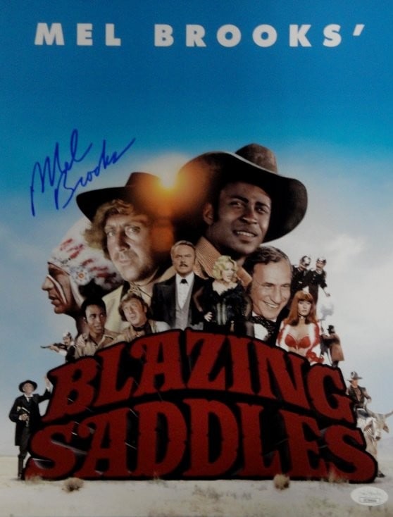 Mel Brooks Autographed 11X14 Photo Blazing Saddles JSA Certified: Mel Brooks Autographed 11X14 Photo Blazing Saddles JSA Certified This remarkable piece features an 11X14 photograph signed by the legendary Mel Brooks, known for his iconic work in film and comedy. Th