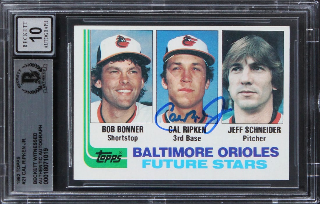 Cal Ripken Jr Signed 1982 Topps Rookie Card Auto 10 Beckett Slabbed: Cal Ripken Jr Signed 1982 Topps Rookie Card Auto 10 Beckett Slabbed This is a stunning 1982 Topps #21 rookie card of Cal Ripken Jr., personally signed by the legendary baseball player himself. The car