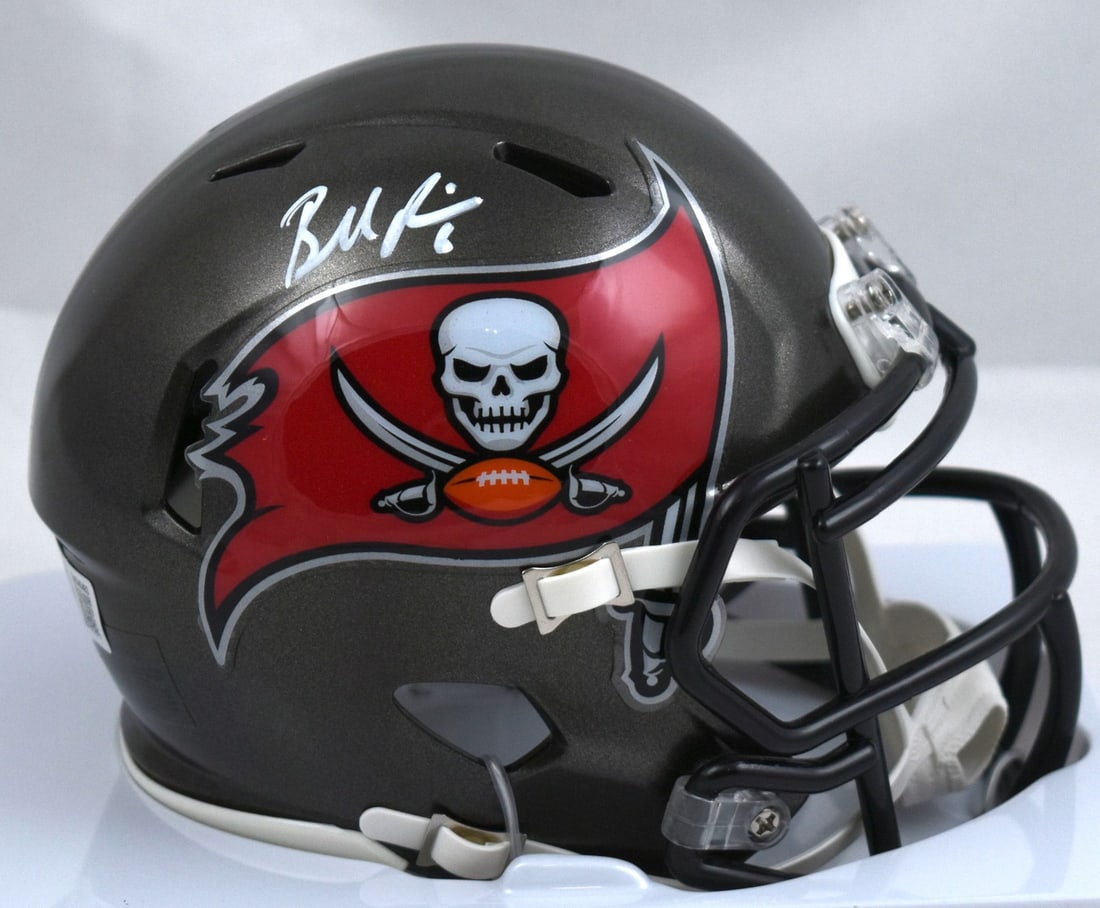 Tampa Bay Buccaneers Mini Helmet Signed by Baker Mayfield With Beckett W Hologram: Tampa Bay Buccaneers Mini Helmet Signed by Baker Mayfield With Beckett W Hologram This pre-owned Tampa Bay Buccaneers Speed mini helmet features an authentic signature from Baker Mayfield. The helmet 