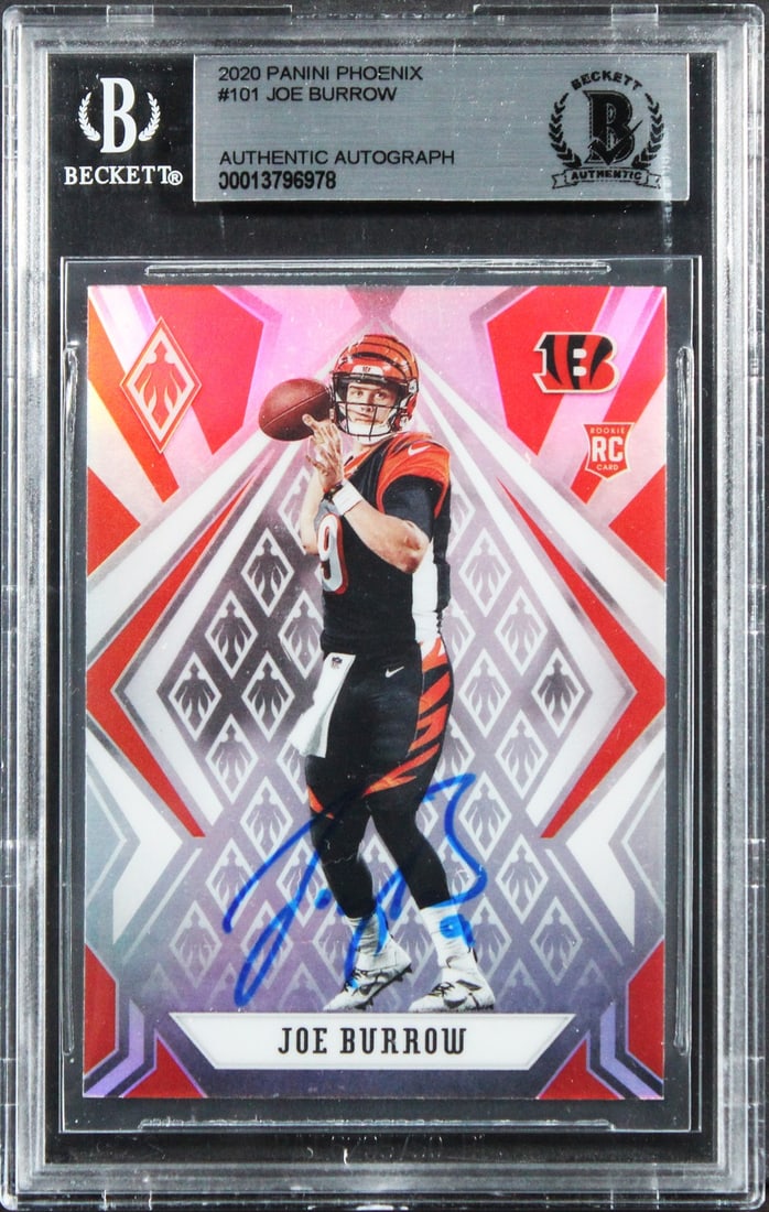 Beckett Slabbed Joe Burrow Signed 2020 Panini Phoenix #101 Bengals Card: Beckett Slabbed Joe Burrow Signed 2020 Panini Phoenix #101 Bengals Card This 2020 Panini Phoenix #101 football card features the authentic signature of Joe Burrow from the Cincinnati Bengals. The card