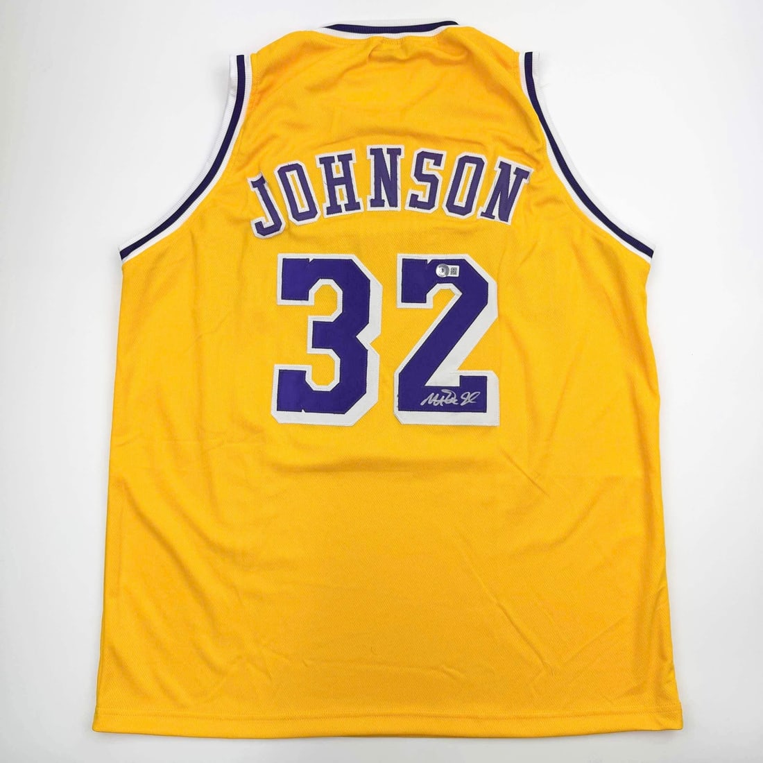 Autographed Magic Johnson Lakers Yellow Jersey with BAS COA: Autographed Magic Johnson Lakers Yellow Jersey with BAS COA Celebrate the legacy of basketball legend Magic Johnson with this autographed Los Angeles Lakers yellow jersey. This original, custom jersey