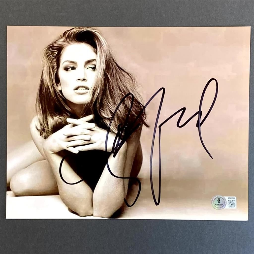 8x10 Photograph Autographed by Cindy Crawford with Beckett Authentication: 8x10 Photograph Autographed by Cindy Crawford with Beckett Authentication This is an original 8x10 photograph signed by model and actress Cindy Crawford. The autograph has been authenticated by Becket