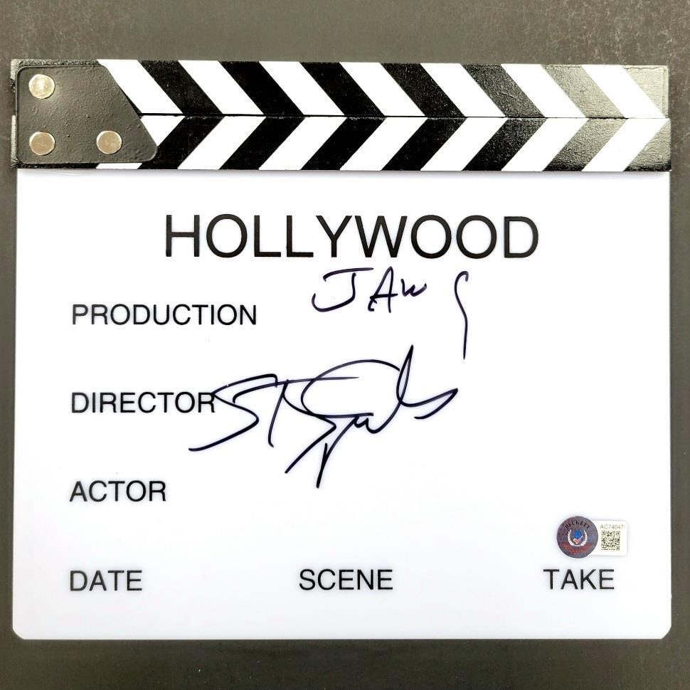 Jaws Director Clapboard Signed by Steven Spielberg With Beckett Authentication: Jaws Director Clapboard Signed by Steven Spielberg With Beckett Authentication This is an original director's clapboard from the movie "Jaws," personally signed by Steven Spielberg. The autograph has 