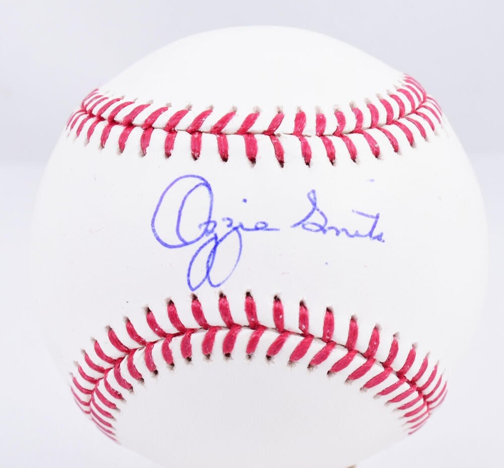 Ozzie Smith Signed OML Baseball with Fanatics Authentication: Ozzie Smith Signed OML Baseball with Fanatics Authentication This is an original OML baseball autographed by the legendary Ozzie Smith, known for his remarkable career with the St. Louis Cardinals. Th