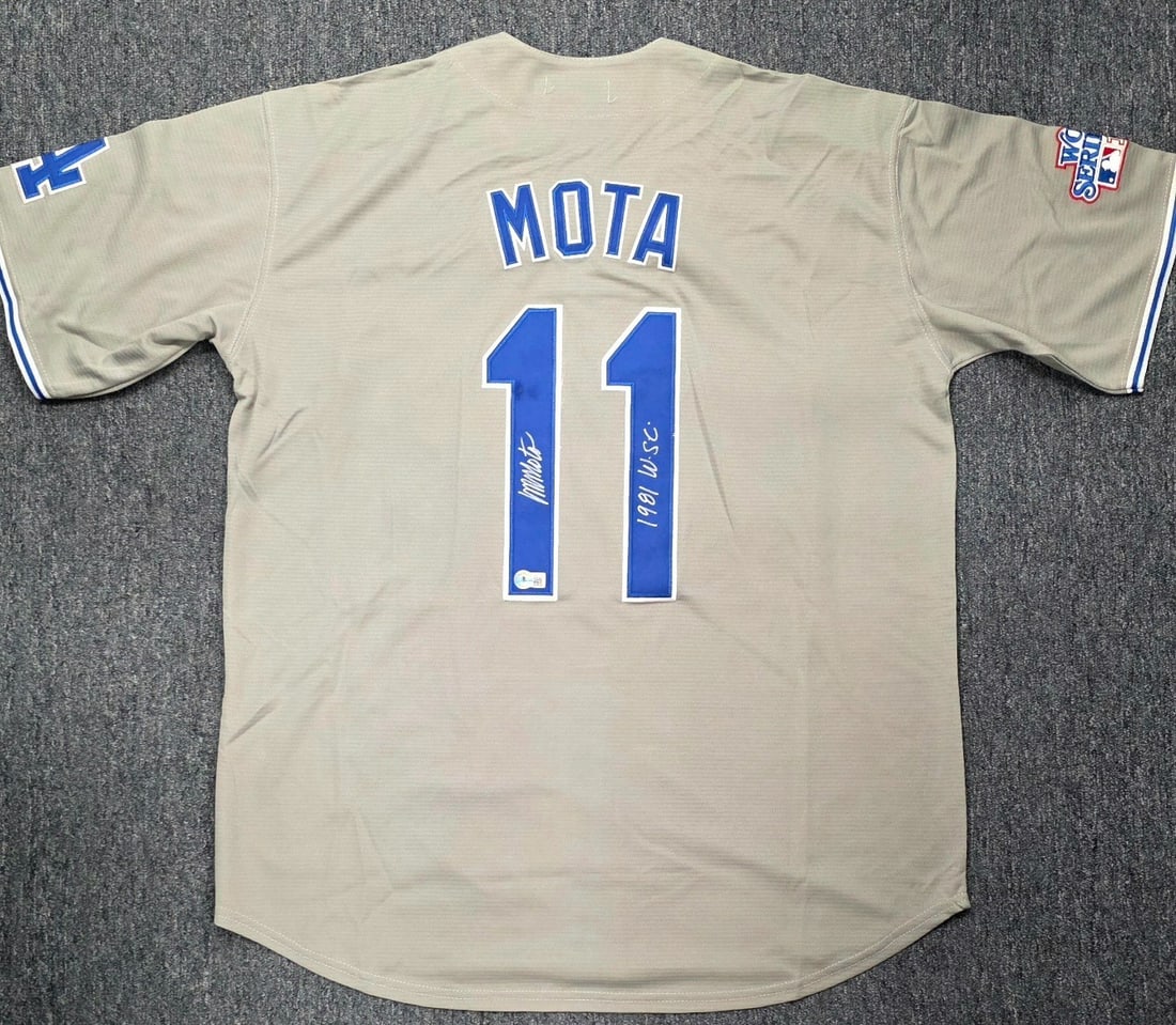 Manny Mota Signed 1981 Dodgers World Series Jersey BAS Authenticated: Manny Mota Signed 1981 Dodgers World Series Jersey BAS Authenticated Celebrate the legacy of baseball with this authentic Manny Mota signed jersey from the 1981 World Series. This original jersey show