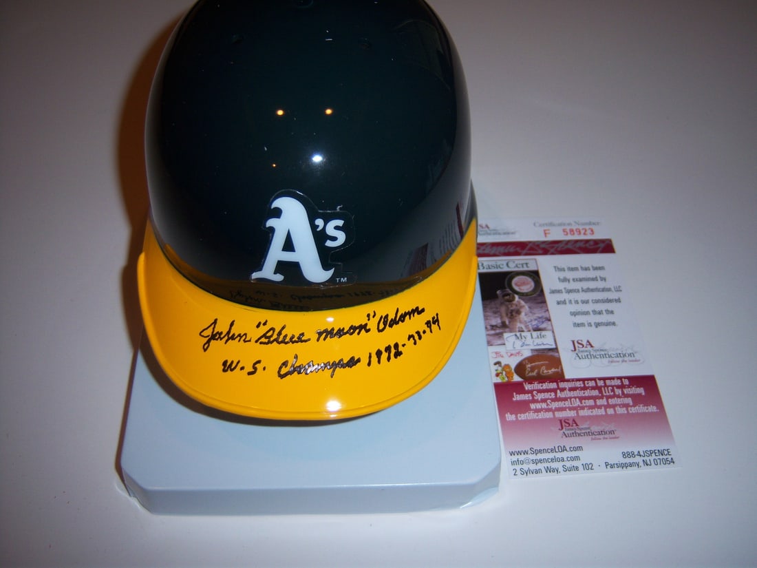 Signed Mini Helmet John Blue Moon Odom Oakland Athletics JSA COA 3X Champion: Signed Mini Helmet John Blue Moon Odom Oakland Athletics JSA COA 3X Champion This mini helmet is signed by John "Blue Moon" Odom of the Oakland Athletics, commemorating the team's three World Series c