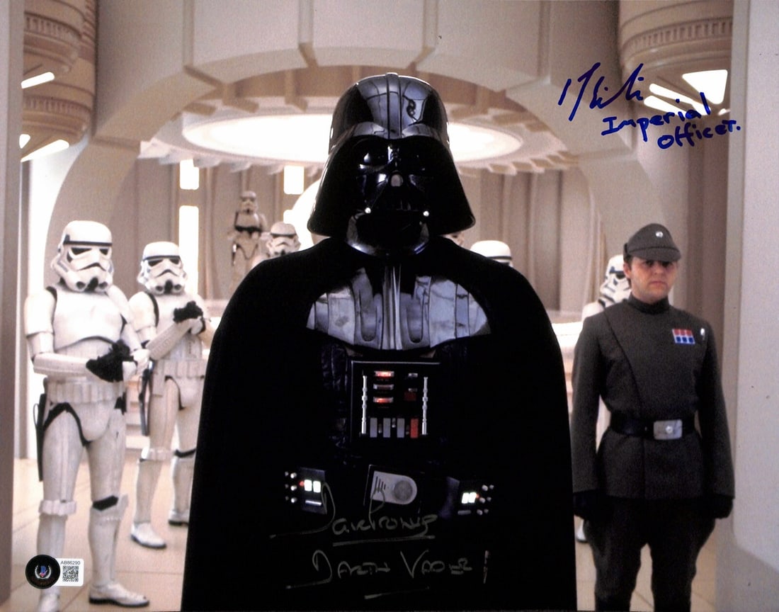 David Prowse Laurence Estrin Signed Star Wars ESB 11x14 Photo Beckett LOA: David Prowse Laurence Estrin Signed Star Wars ESB 11x14 Photo Beckett LOA This stunning 11x14 color photograph captures iconic moments from "Star Wars: The Empire Strikes Back," featuring the signatur