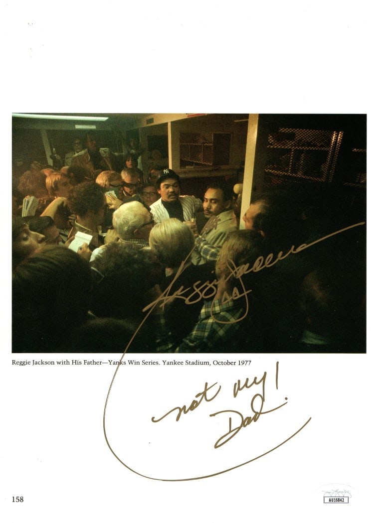 Reggie Jackson Signed Photograph Not My Dad JSA Authenticated 8.5 x 11.75: Reggie Jackson Signed Photograph Not My Dad JSA Authenticated 8.5 x 11.75 This original autographed photograph features Reggie Jackson, a legendary player for the New York Yankees. The photo, measurin