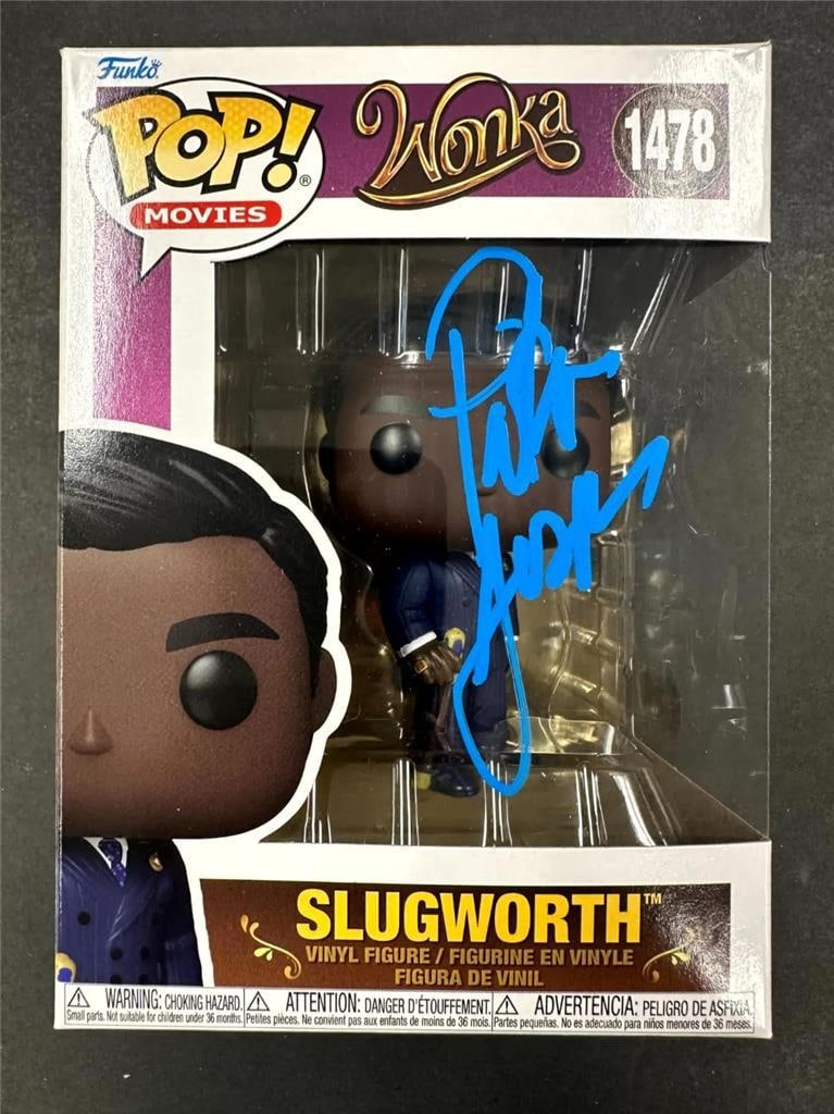 Slugworth Funko Pop signed by Paterson Joseph with Beckett authentication: Slugworth Funko Pop signed by Paterson Joseph with Beckett authentication This Funko Pop! figure of Slugworth from Wonka is signed by Paterson Joseph. The autograph is authenticated by Beckett and the